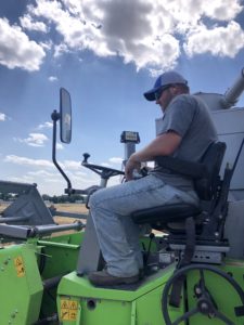 Nathan Miller, Limagrain Cereal Seeds Regional Commerical Manager for the Central Plains, Harvesting Research Plots of Hard Red Winter Wheat Seed